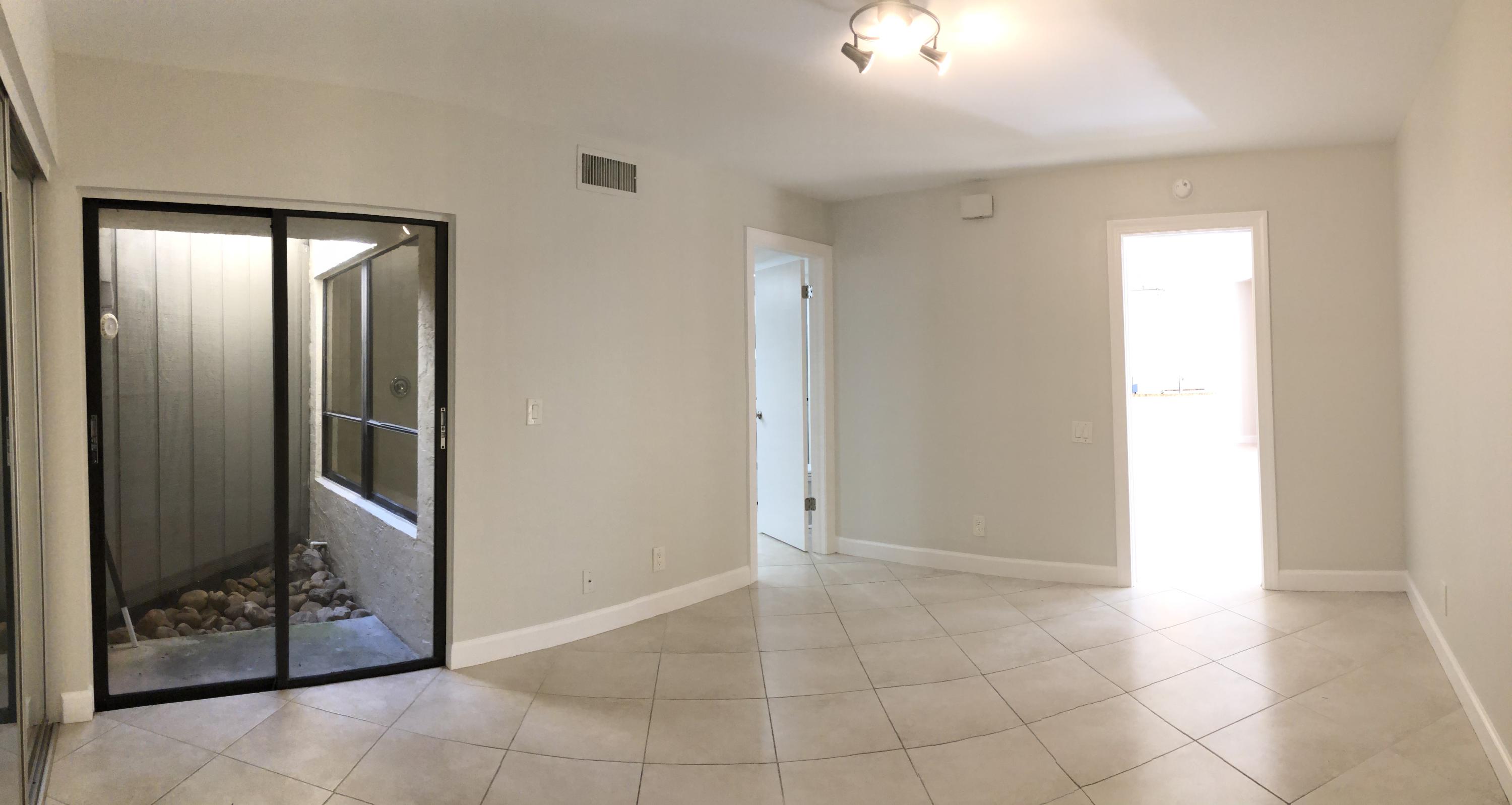 1605 Highway 1, Unit 14C Jupiter, FL 33477 - Photo 16 of 32 Master Bedroom