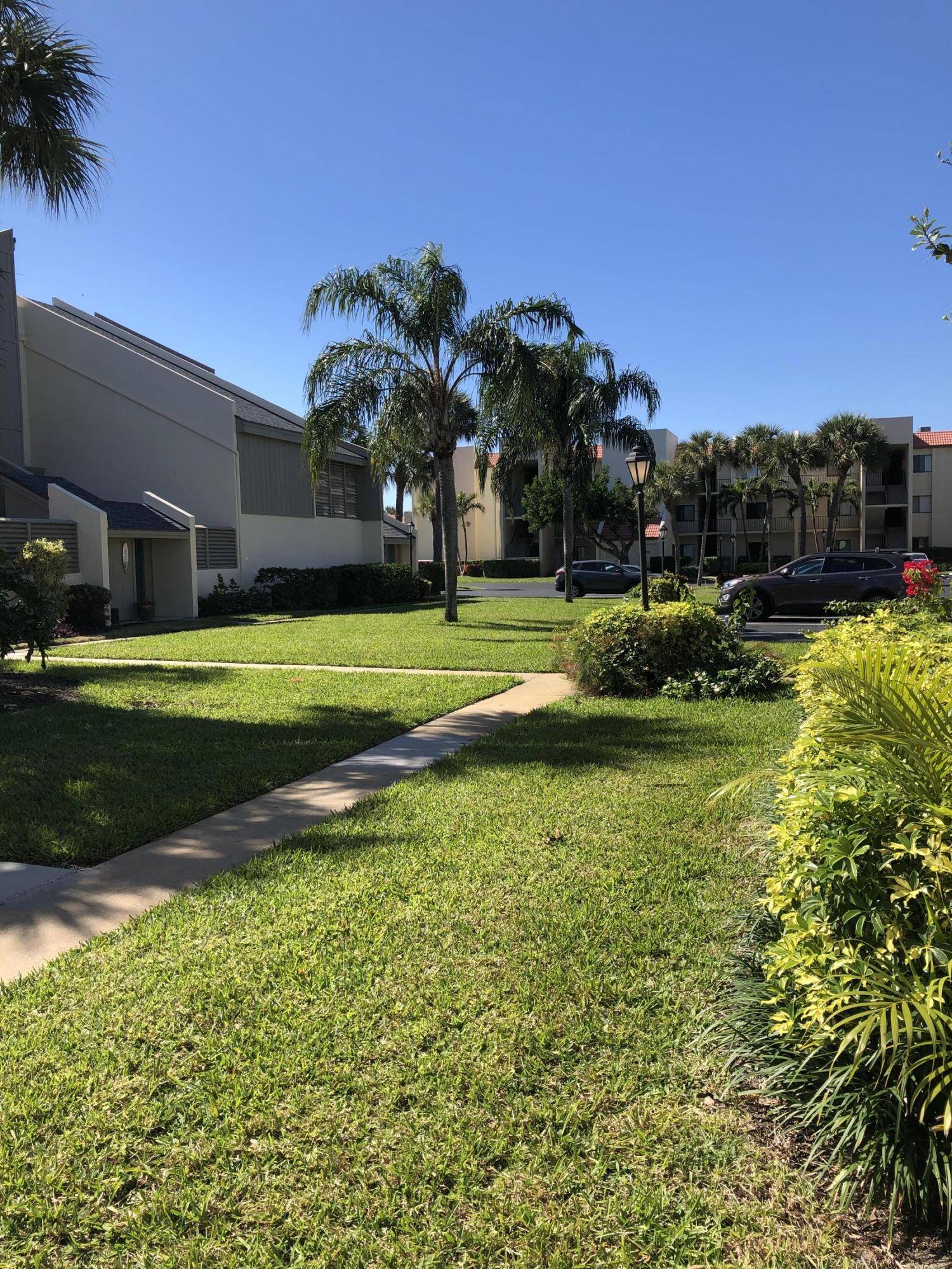 1605 Highway 1, Unit 14C Jupiter, FL 33477 - Photo 22 of 32 Side Walk
