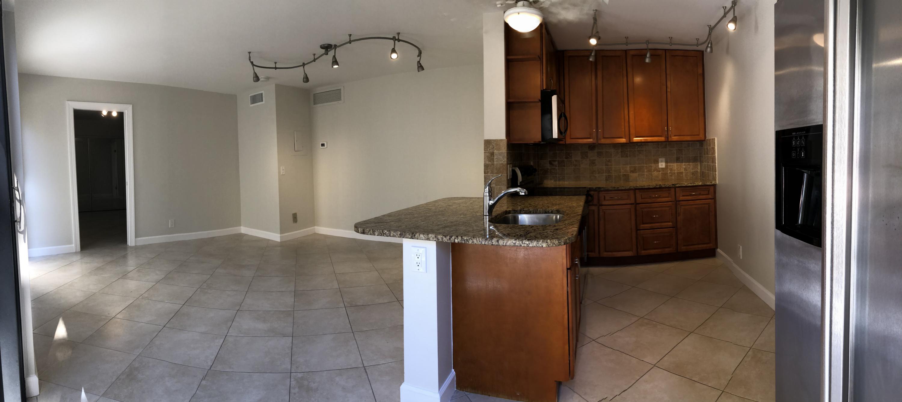 1605 Highway 1, Unit 14C Jupiter, FL 33477 - Photo 10 of 32 Kitchen Living Room
