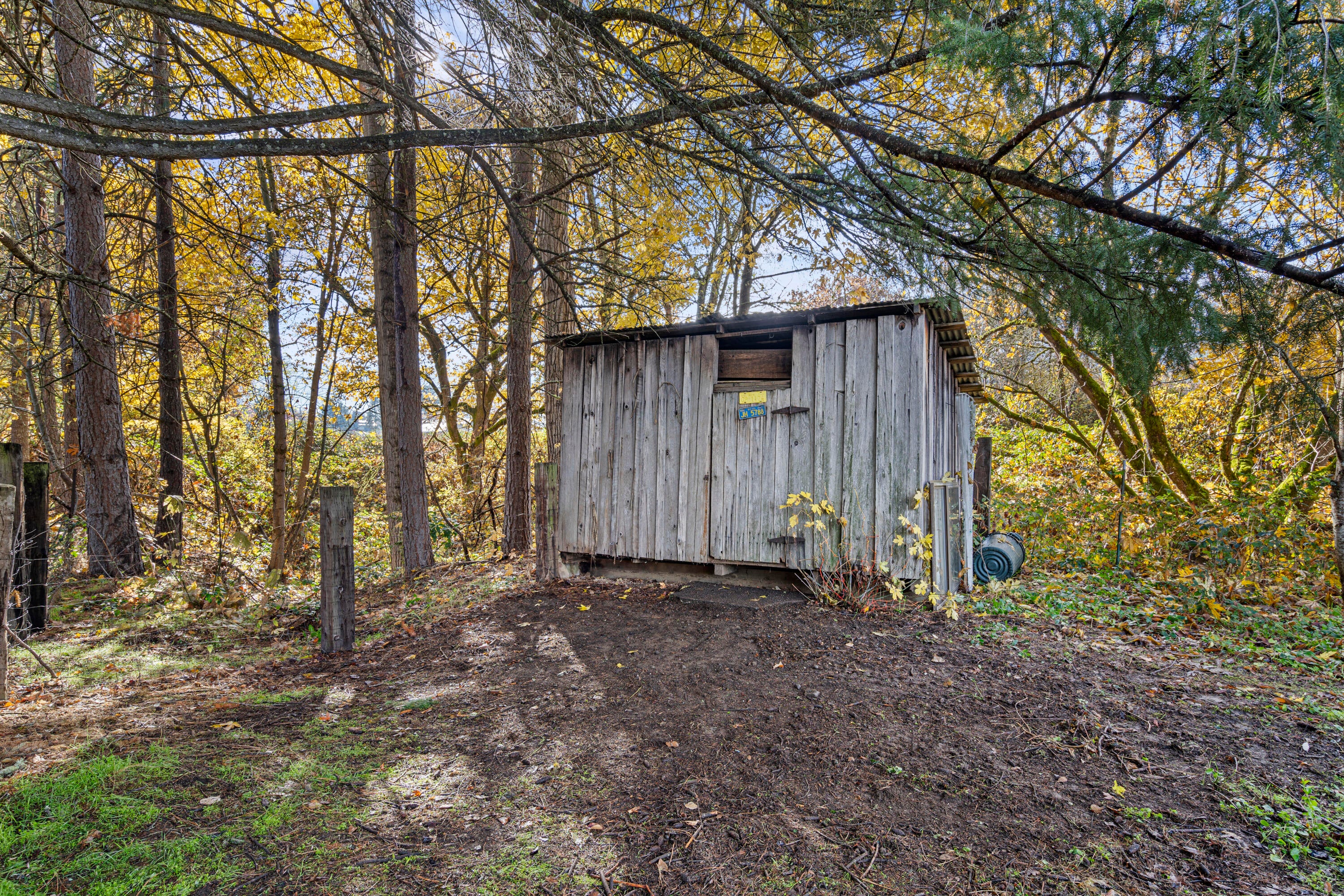 7771 Old Stage Road Central Point, OR 97502 - Photo 38 of 42 Shed by the seasonal Kane Creek