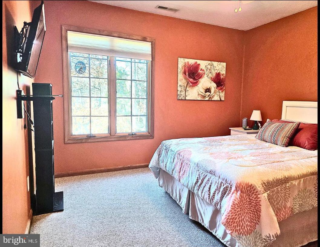 5632 Galestown - Reliance Road Rhodesdale, MD 21659 - Photo 21 of 25 a bedroom with a bed and a window