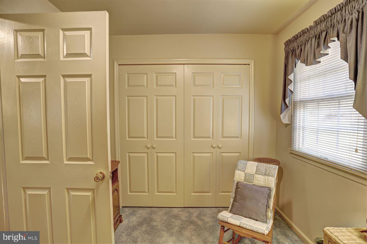 5 Rettinger Road Halifax, PA 17032 - Photo 21 of 25 a view of a livingroom with chair and door