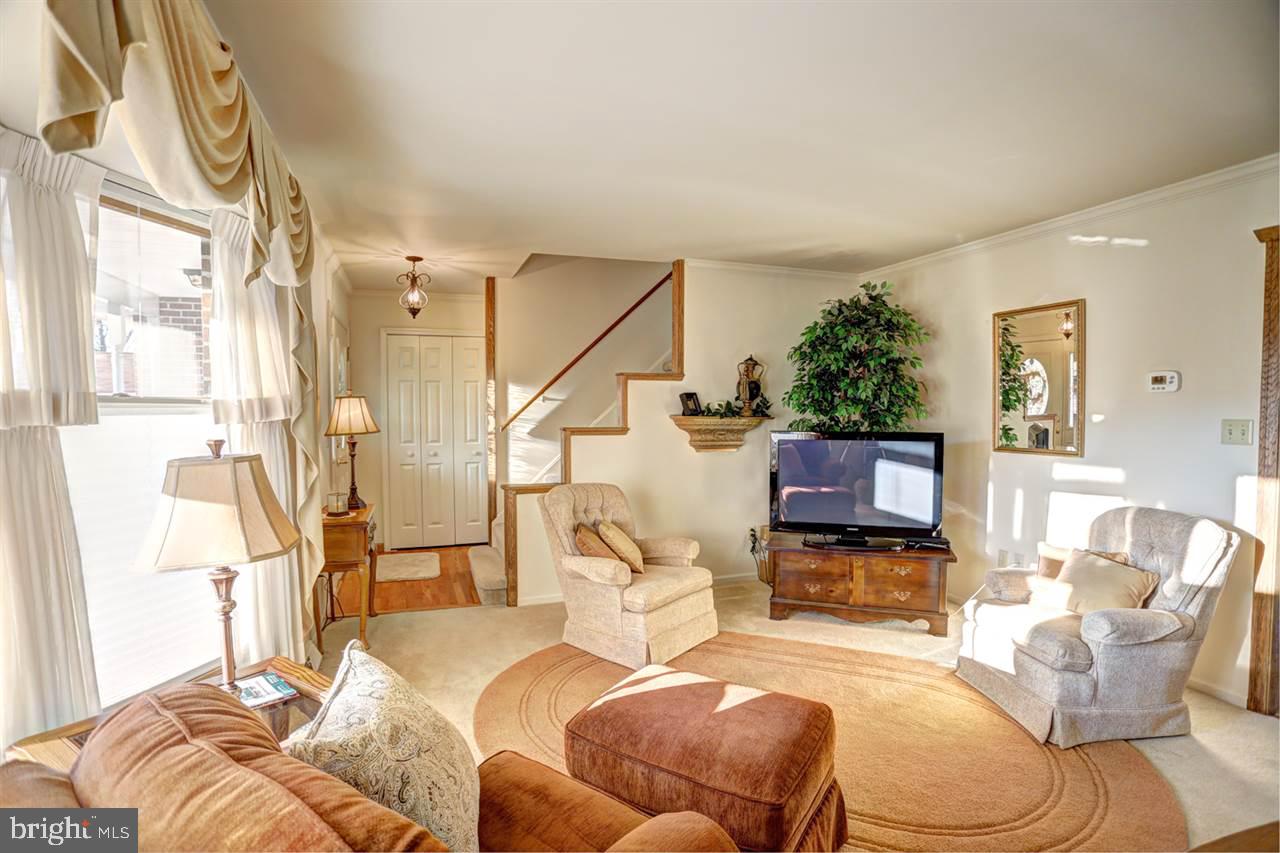 5 Rettinger Road Halifax, PA 17032 - Photo 6 of 25 a living room with furniture a flat screen tv and a fireplace