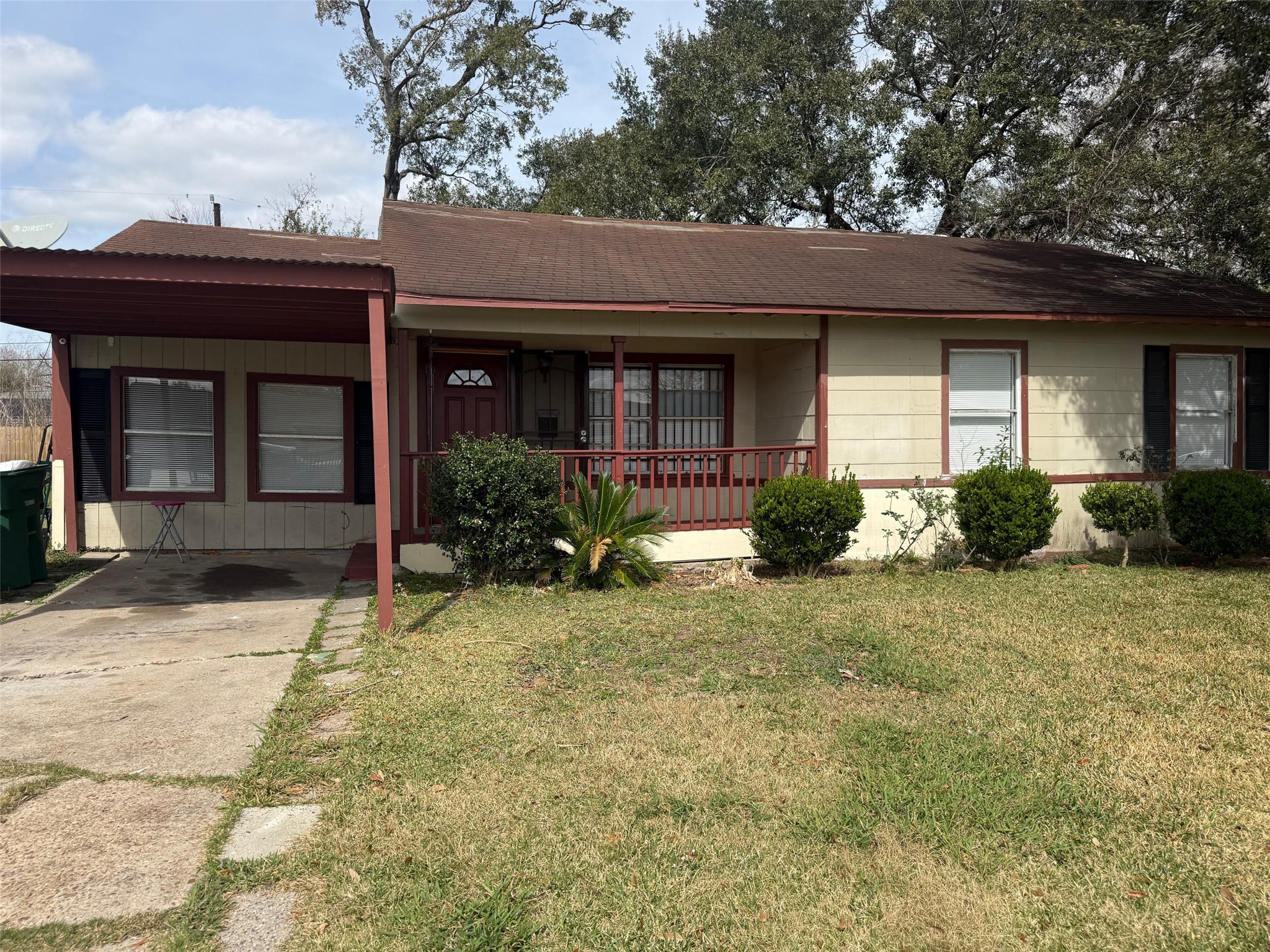 5933 Southgood Street Houston, TX 77033 - Photo 1 of 10 a front view of a house with garden