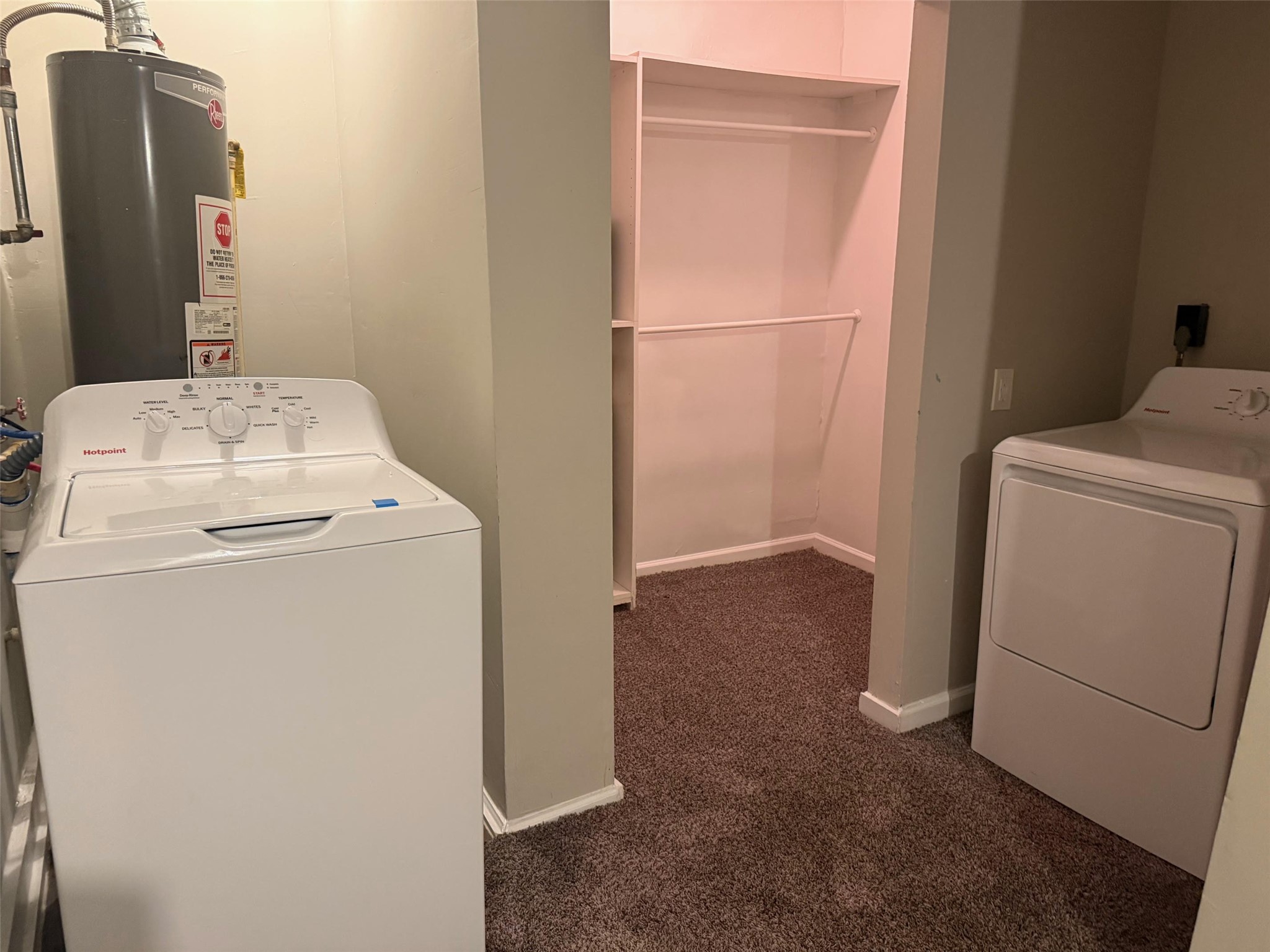 5933 Southgood Street Houston, TX 77033 - Photo 3 of 10 a utility room with dryer and washer
