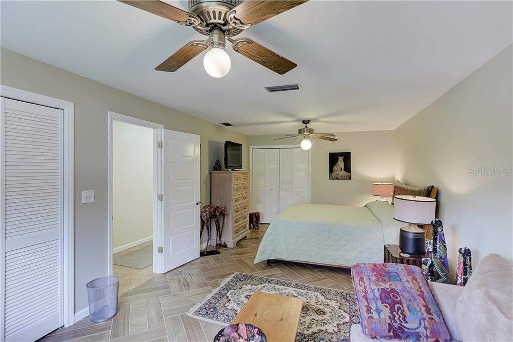 4873 Old Ranch Road Sarasota, FL 34241 - Photo 18 of 49 One of the 2 master bedrooms. This one is on the west side of the house. It measures 23' x 12'.