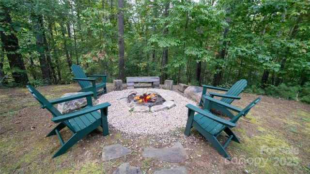 a view of a bench in a backyard