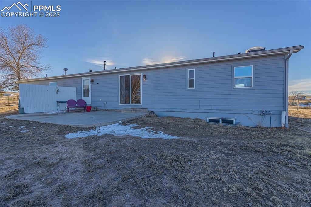 29550 Paint Mine Road Calhan, CO 80808 - Photo 24 of 33 a view of livingroom with natural light