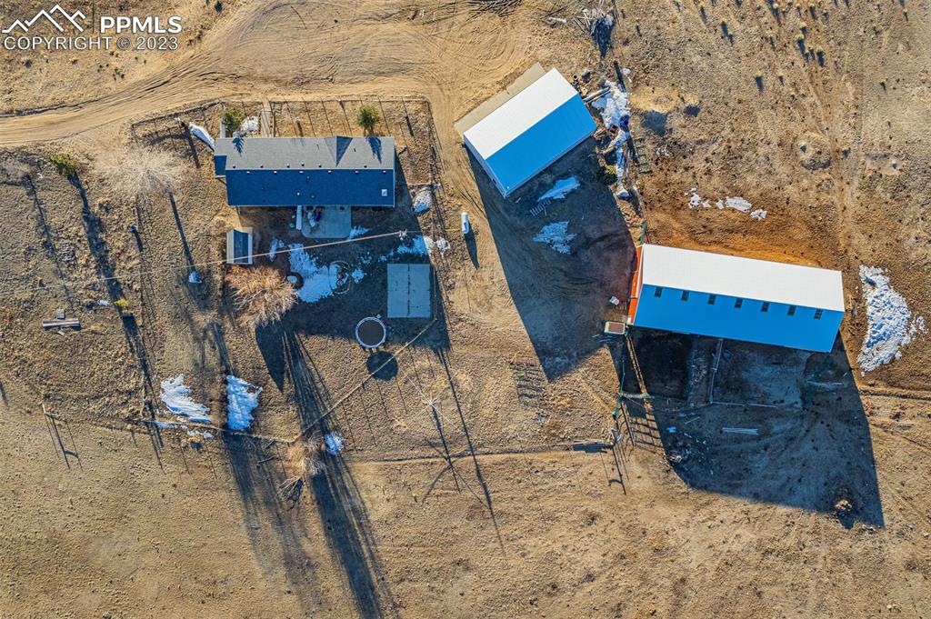 29550 Paint Mine Road Calhan, CO 80808 - Photo 28 of 33 a view of building along with trees