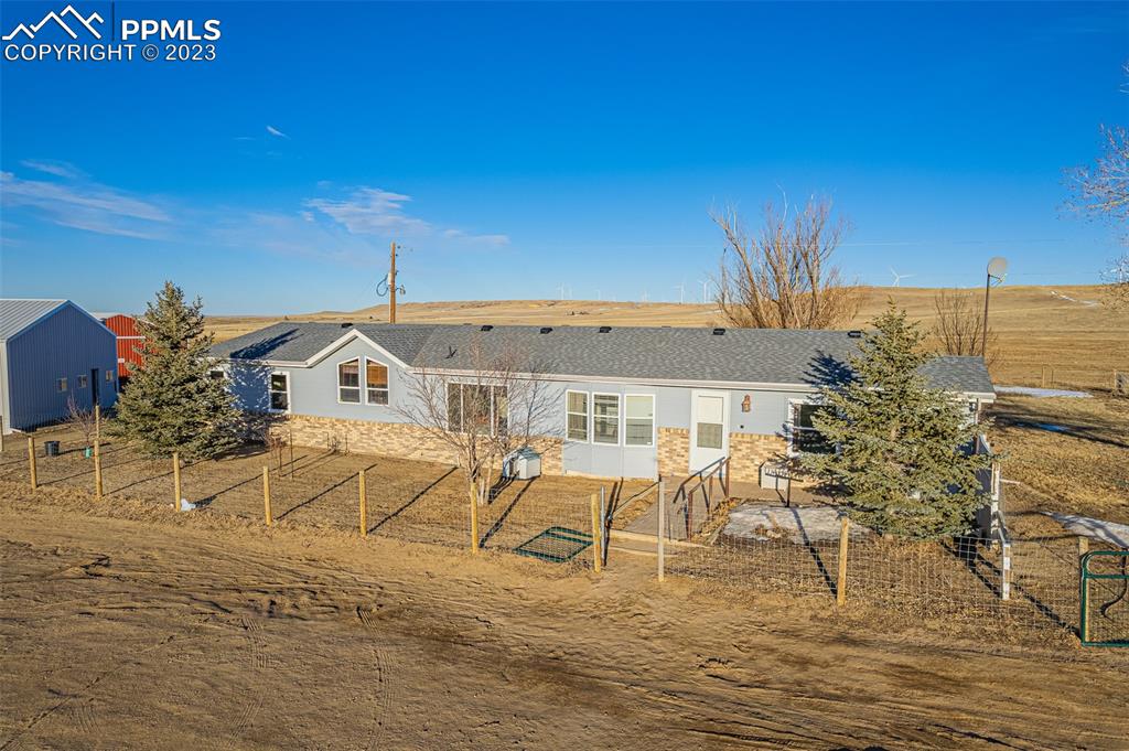 29550 Paint Mine Road Calhan, CO 80808 - Photo 31 of 33 a view of a house with outdoor space