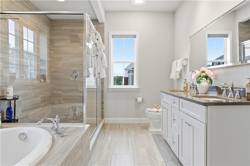 1502 Orion Road Bridgeville, PA 15017 - Photo 29 of 46 a bathroom with a sink a toilet and shower