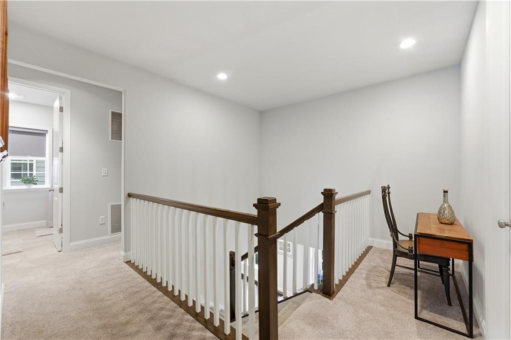 1502 Orion Road Bridgeville, PA 15017 - Photo 31 of 46 a view of a hallway and a livingroom with furniture