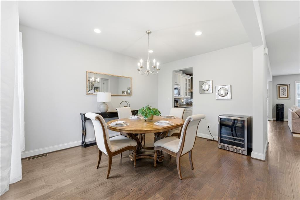 1502 Orion Road Bridgeville, PA 15017 - Photo 5 of 46 a view of a dining room with furniture and wooden floor