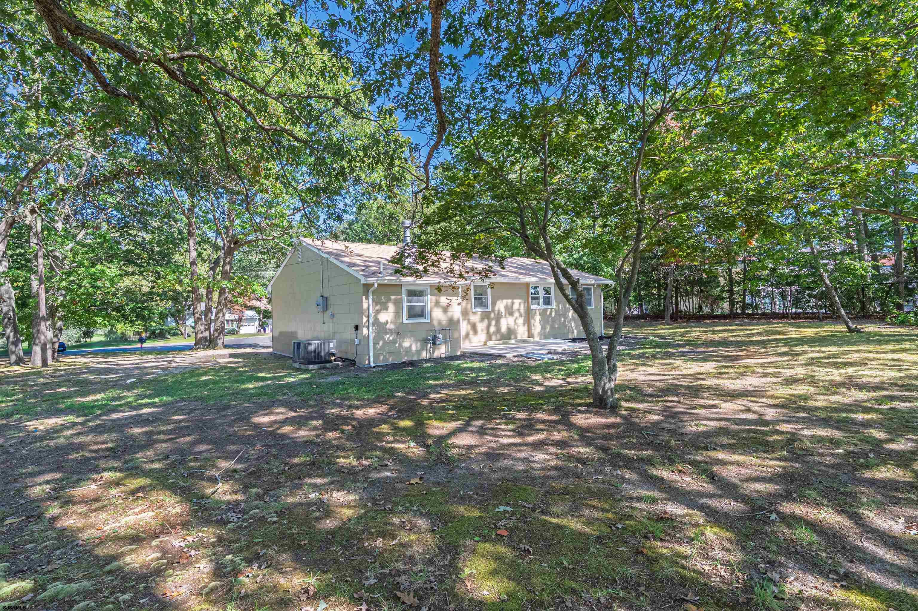 310 Sandy Lane Galloway Township, NJ 08205 - Photo 11 of 48 a view of a house with a yard