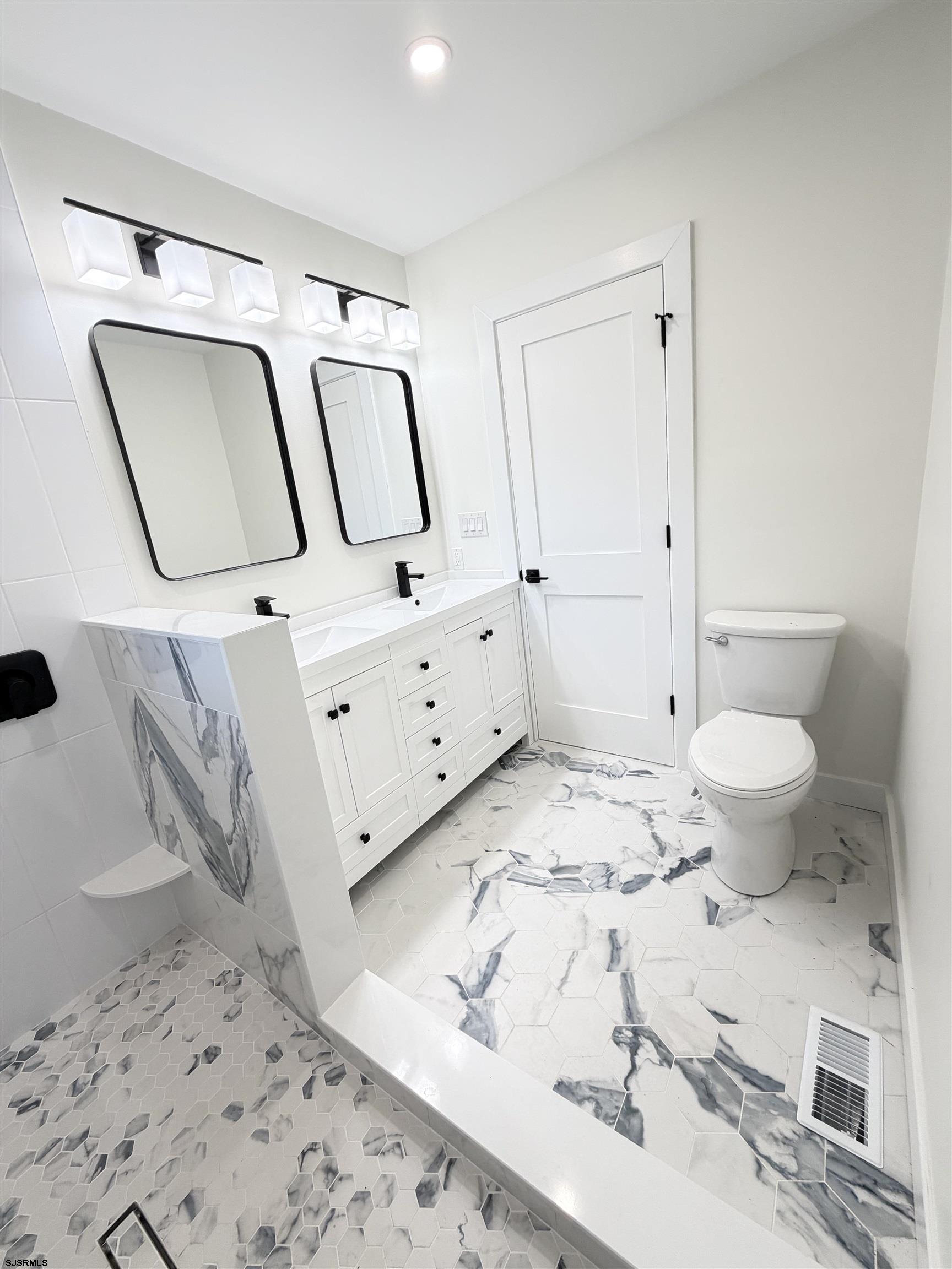 310 Sandy Lane Galloway Township, NJ 08205 - Photo 28 of 48 a bathroom with a sink toilet and shower