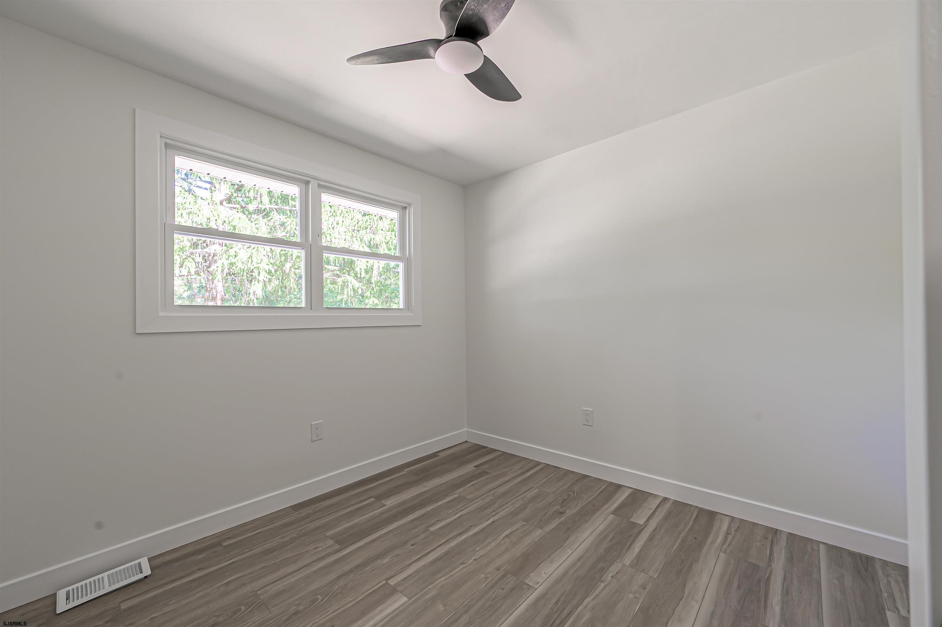 310 Sandy Lane Galloway Township, NJ 08205 - Photo 32 of 48 an empty room with a window