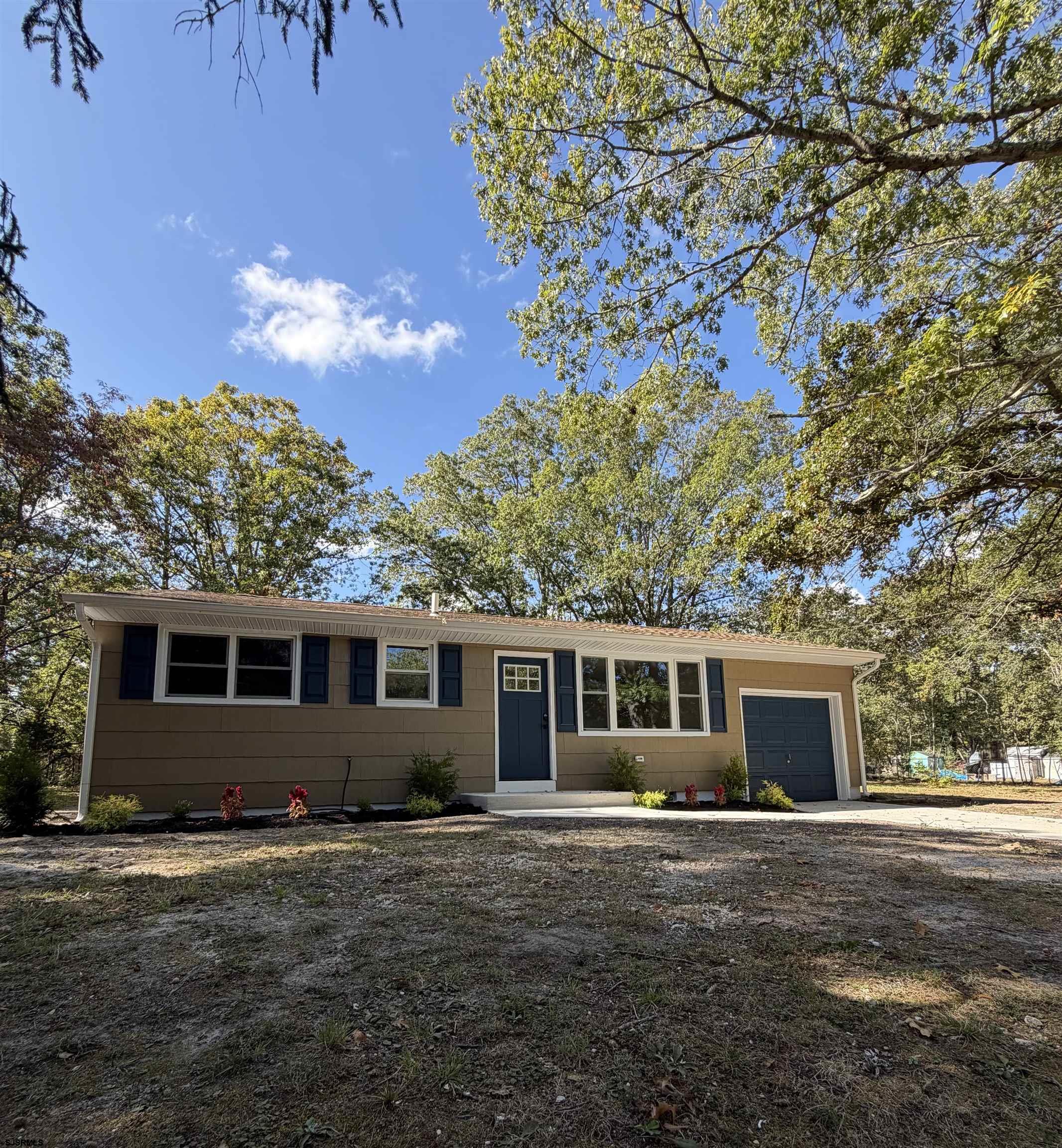 310 Sandy Lane Galloway Township, NJ 08205 - Photo 6 of 48 front view of a house with a big yard