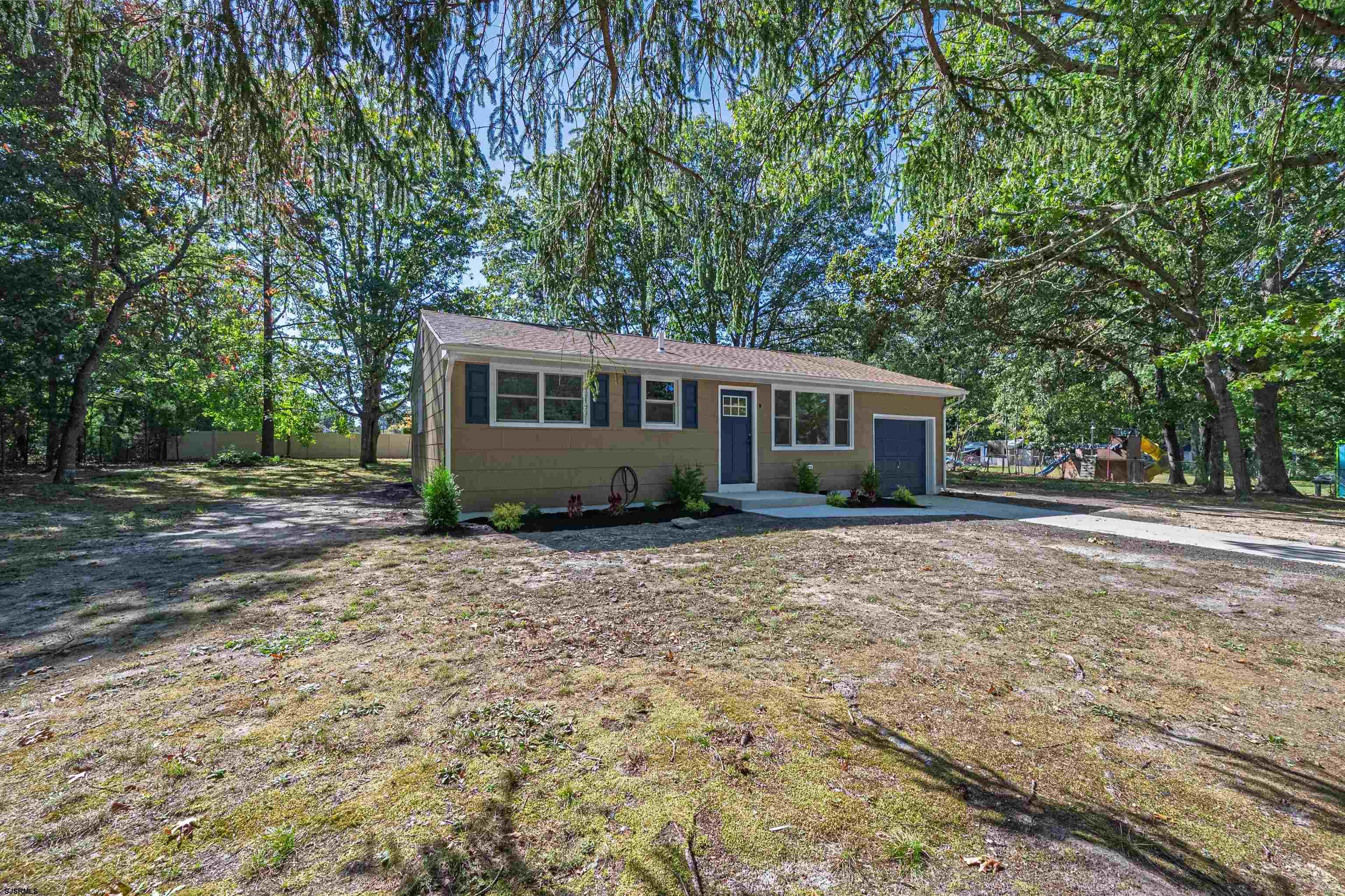 310 Sandy Lane Galloway Township, NJ 08205 - Photo 8 of 48 a view of a house with a yard