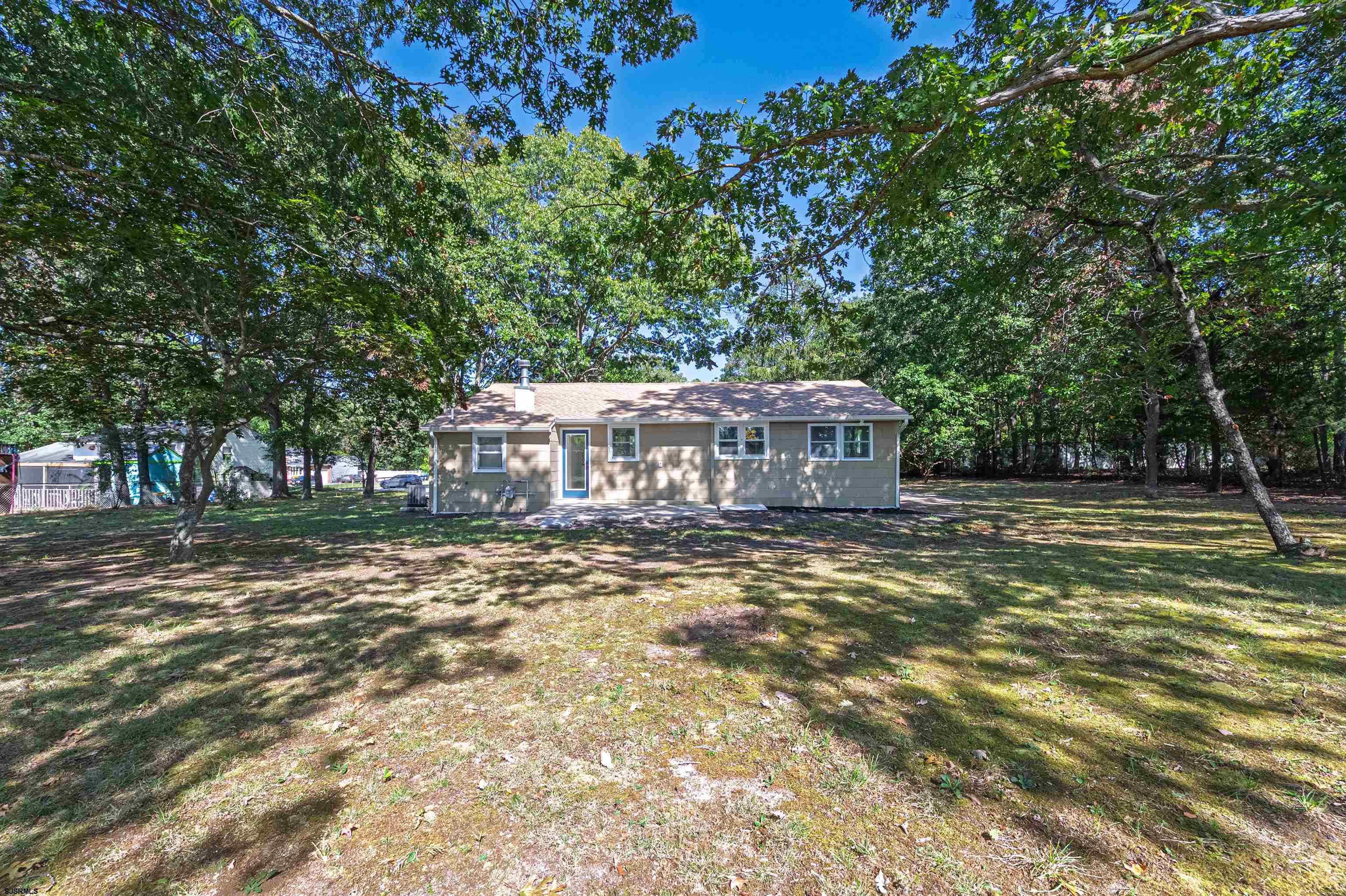 310 Sandy Lane Galloway Township, NJ 08205 - Photo 9 of 48 a view of a house with yard and tree s
