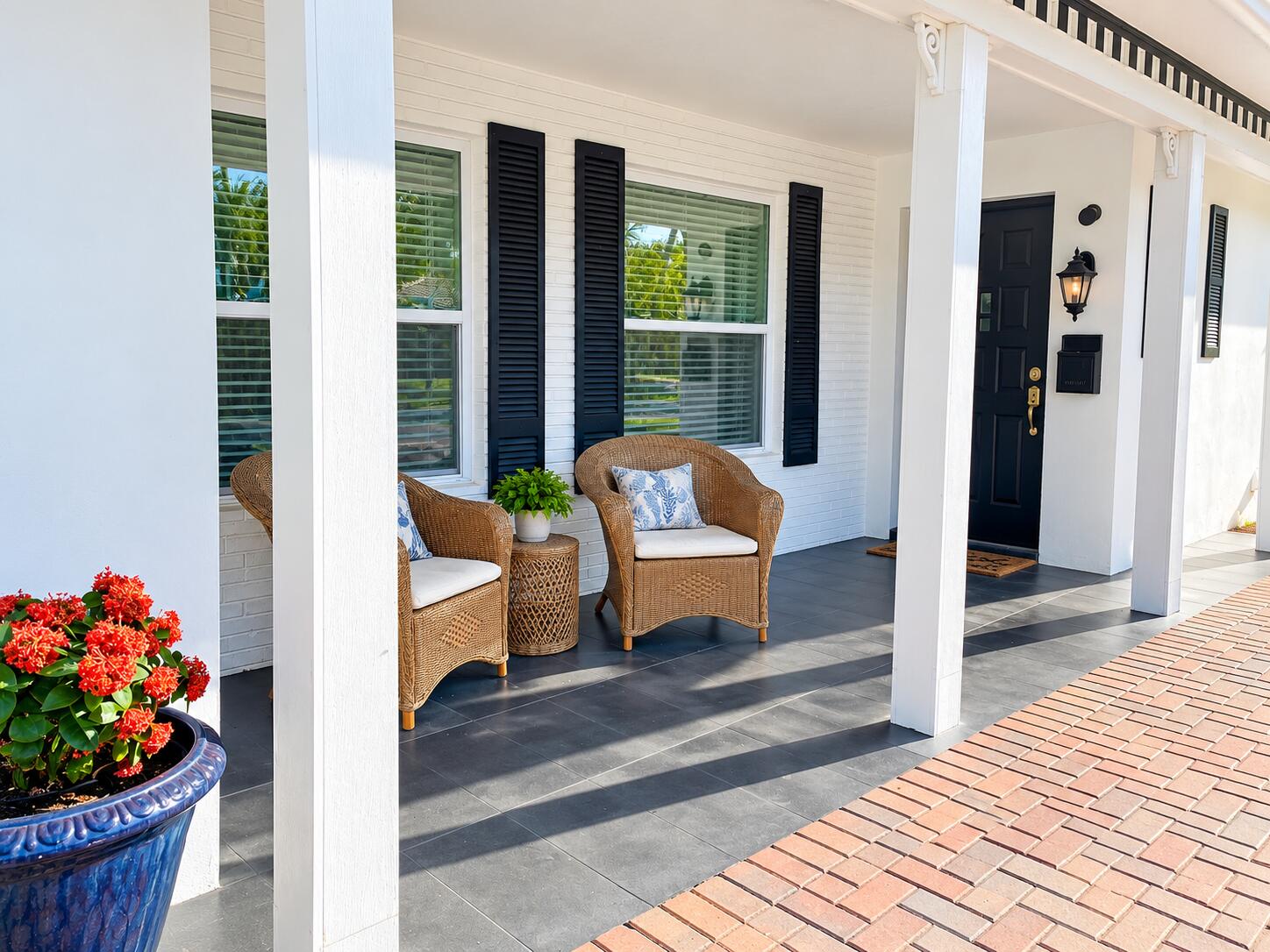 266 Southwest 12th Street Boca Raton, FL 33432 - Photo 30 of 30 Sunlit Coastal Porch with Wicker Seating