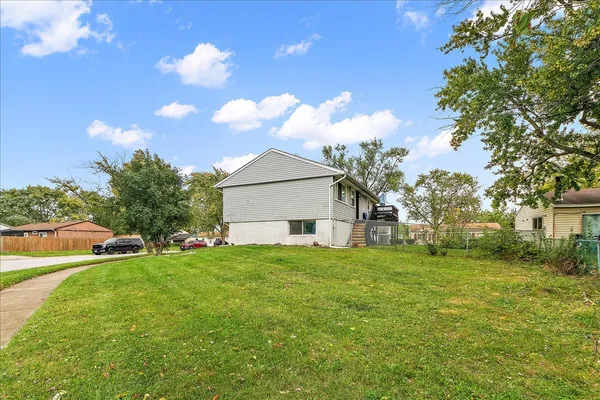a house view with a garden space