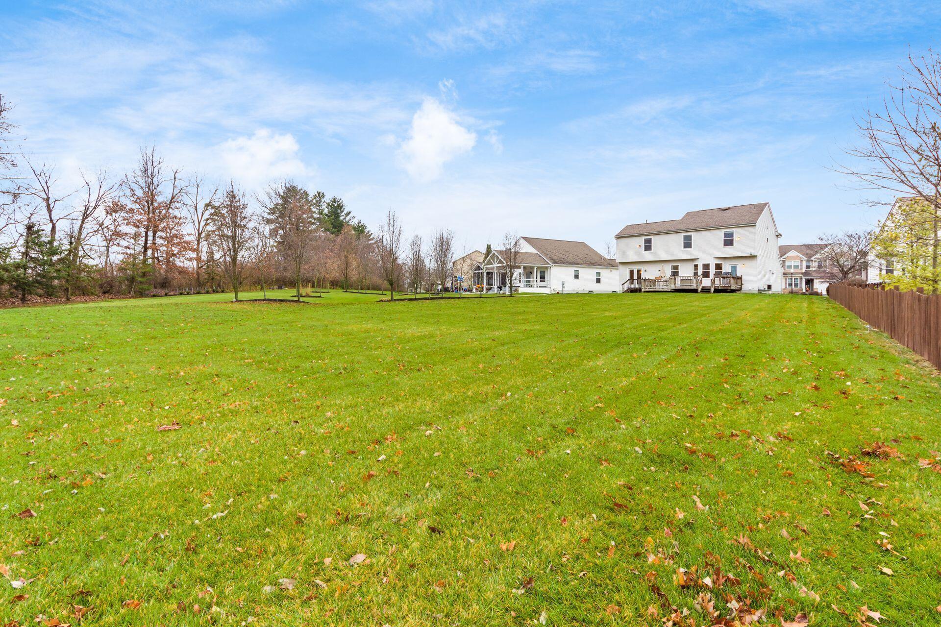 405 Shellbark Road Marysville, OH 43040 - Photo 4 of 39 Large Yard Backing up to community walking path and woods