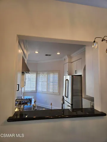 a room with gym equipment and a large window