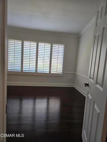 a view of empty room with windows