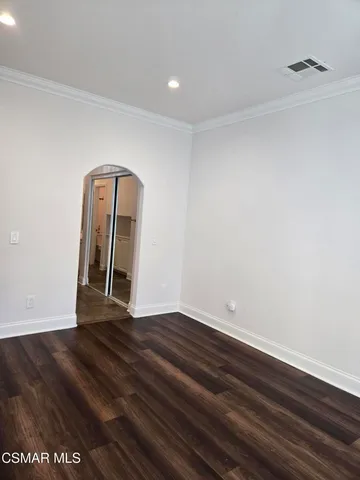 a bathroom with a sink a mirror and a shower