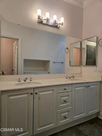 a bathroom with a sink and a toilet