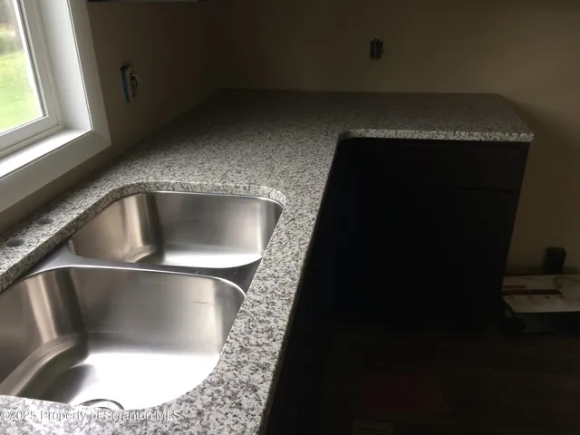 a close view of a sink in the kitchen