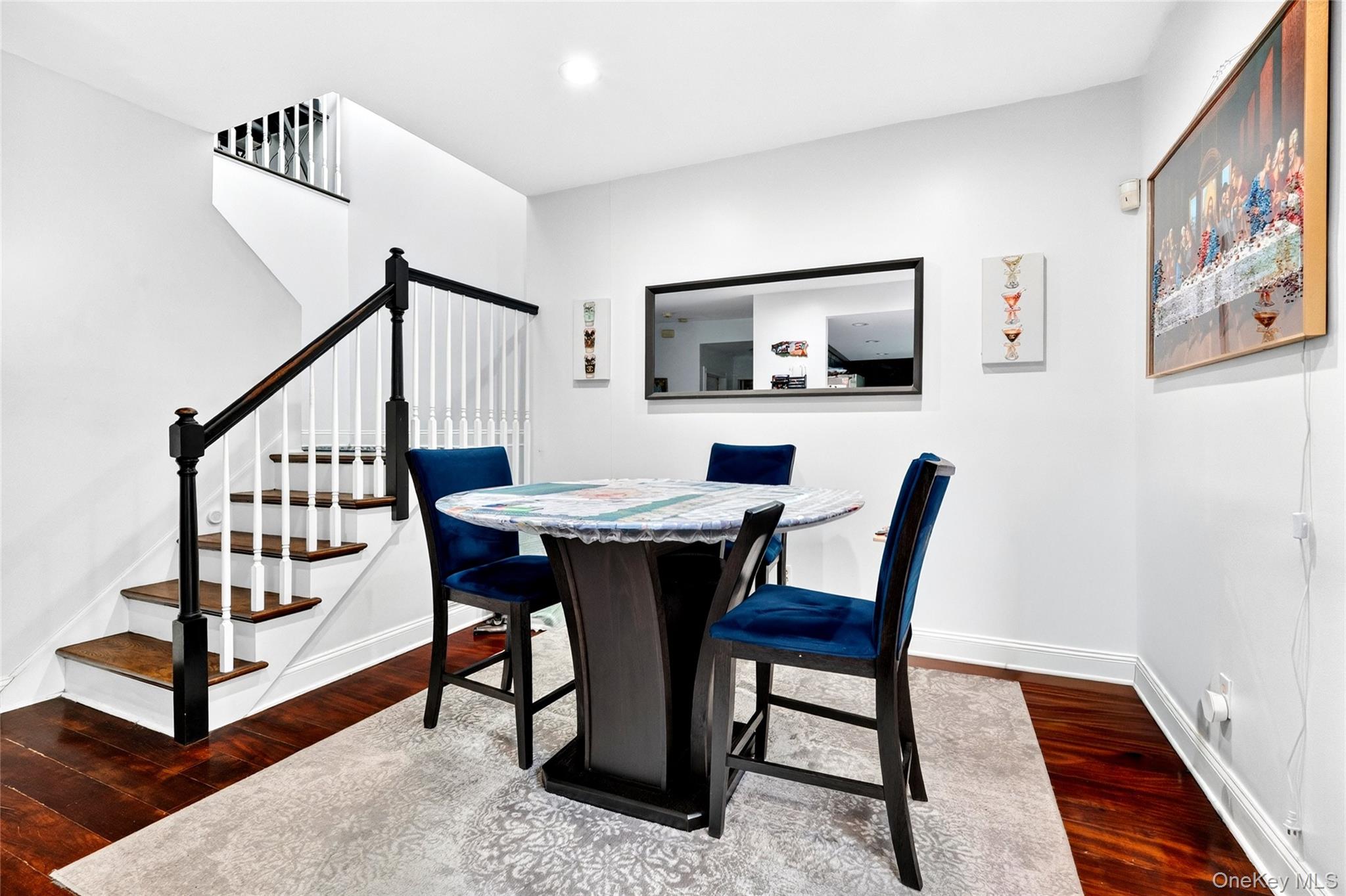 47 Westbrook Road, Unit 47 Newburgh, NY 12550 - Photo 12 of 43 a view of a dining room with furniture and wooden floor