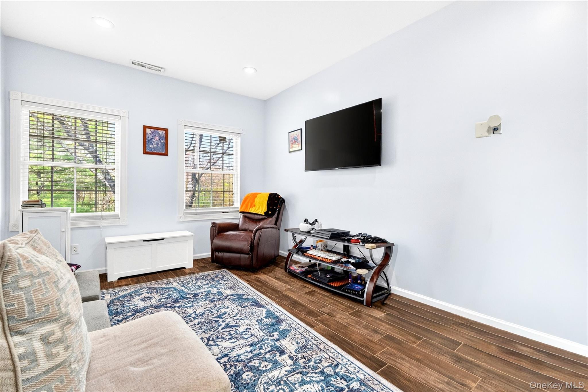 47 Westbrook Road, Unit 47 Newburgh, NY 12550 - Photo 18 of 43 a living room with furniture and a flat screen tv