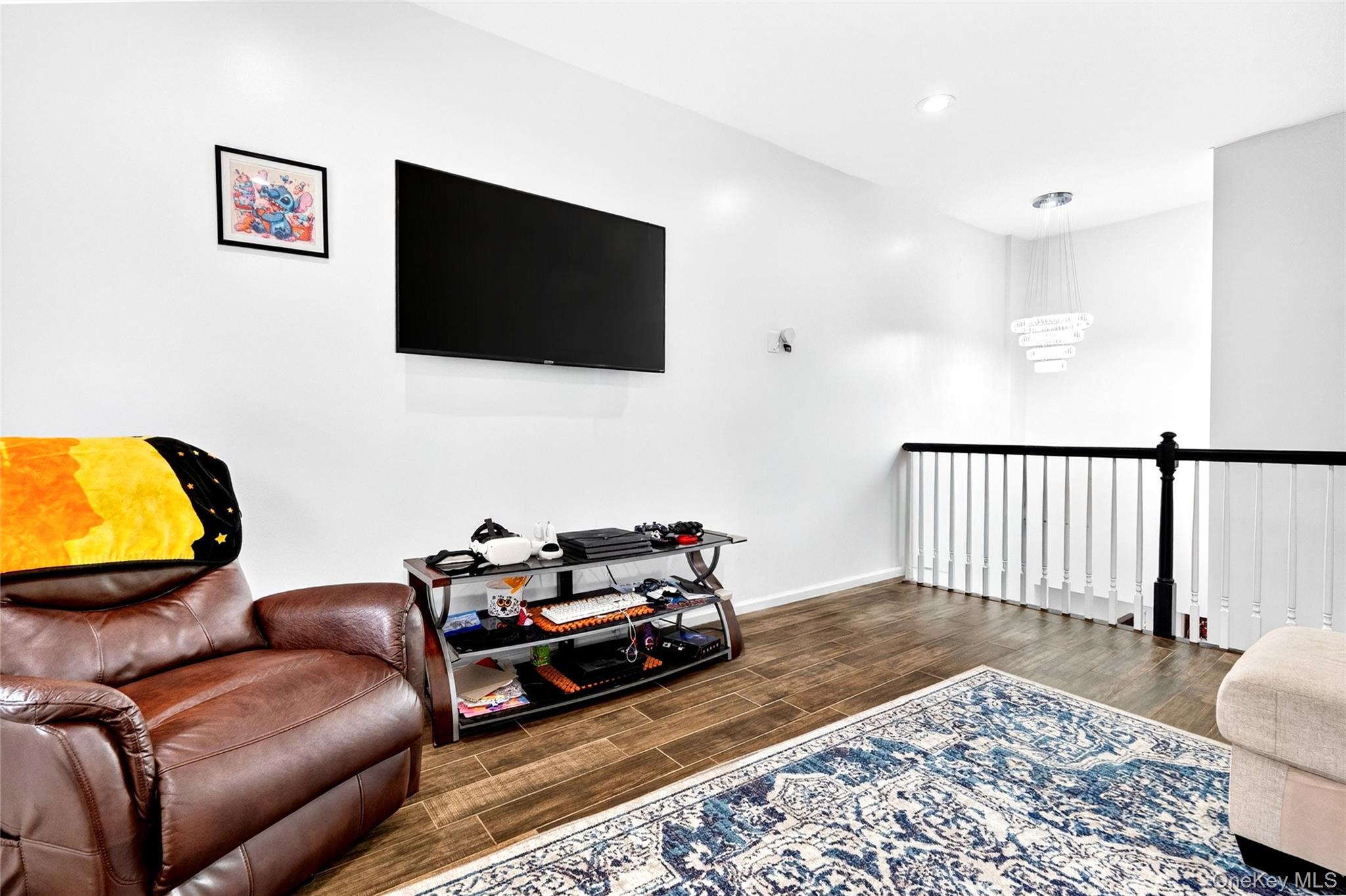 47 Westbrook Road, Unit 47 Newburgh, NY 12550 - Photo 20 of 43 a living room with furniture and a flat screen tv