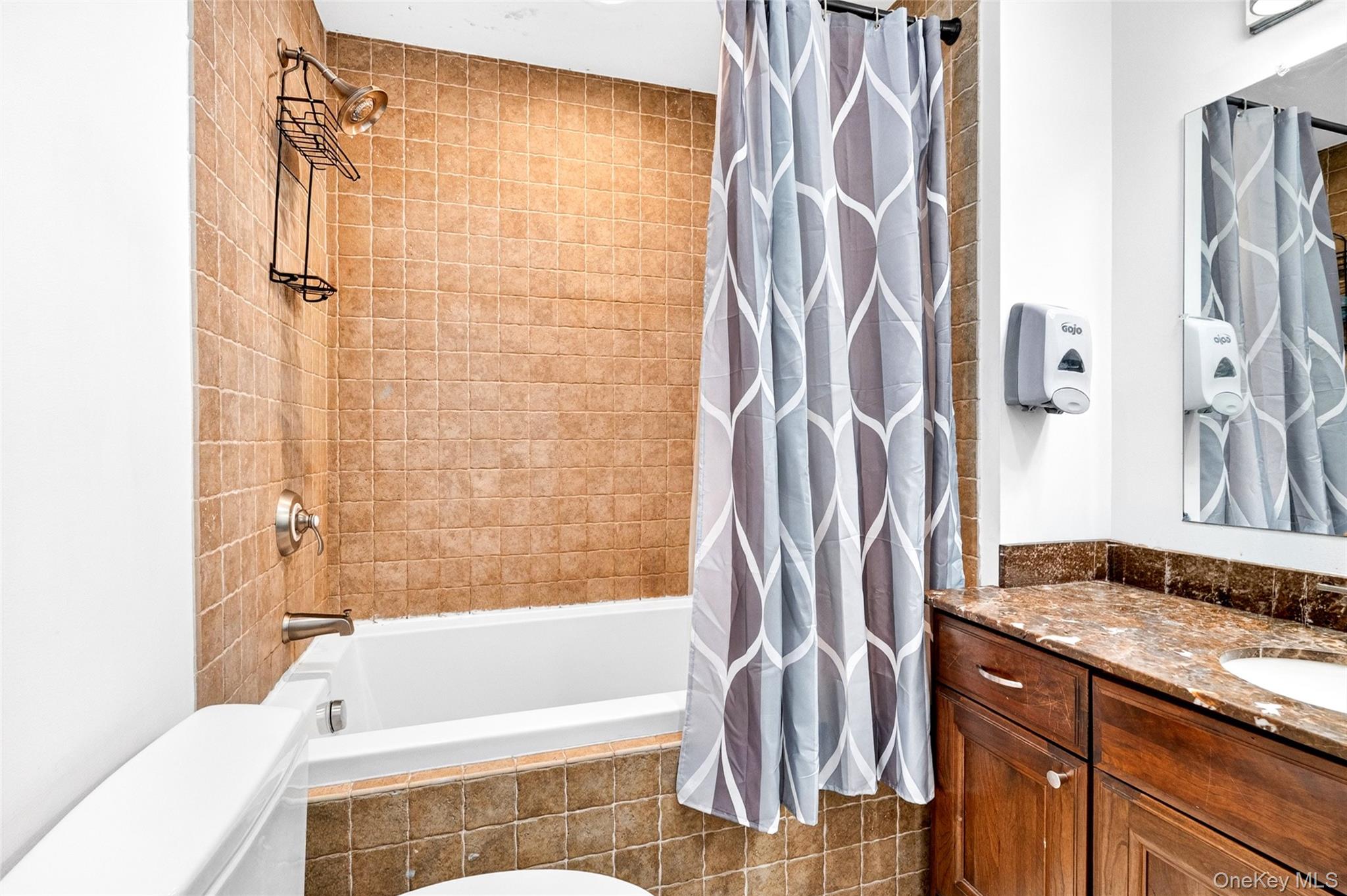 47 Westbrook Road, Unit 47 Newburgh, NY 12550 - Photo 33 of 43 a bathroom with a granite countertop bathtub shower sink and a shower
