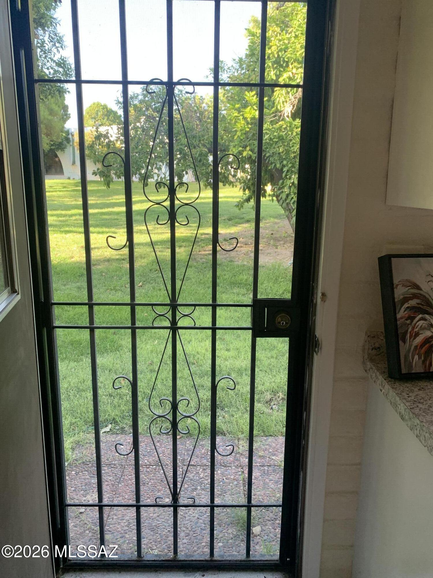 711 West Las Lomitas Road Tucson, AZ 85704 - Photo 17 of 29 BACK SECURITY GATE TO COMMON AREAS