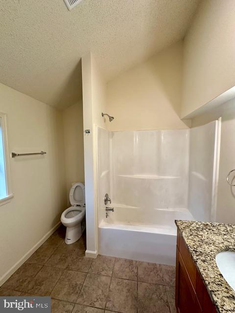 19 North Bridge Street, Unit 201 Round Hill, VA 20141 - Photo 11 of 14 a bathroom with a granite countertop bathtub shower and toilet