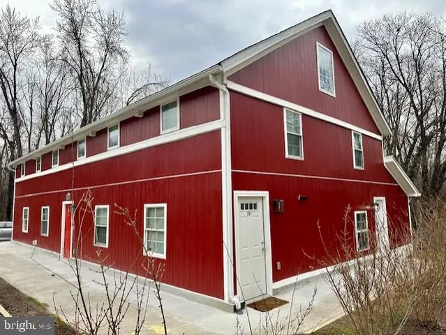 a front view of a house with a garage