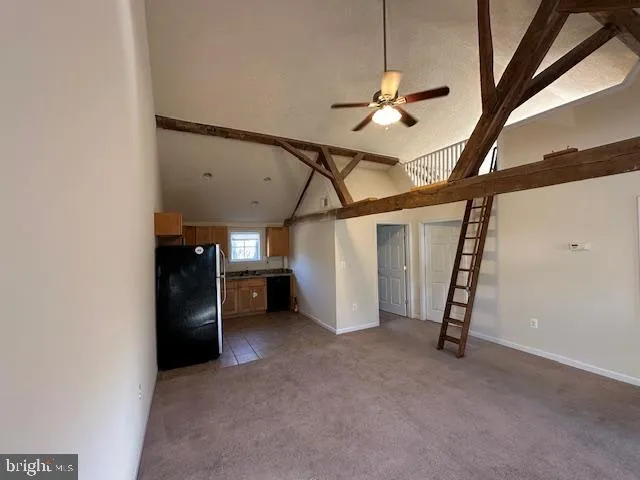 a view of a livingroom with furniture