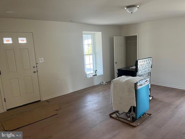 2210 New Falls Road, Unit A Bristol, PA 19007 - Photo 6 of 9 a living room with couch chairs and windows