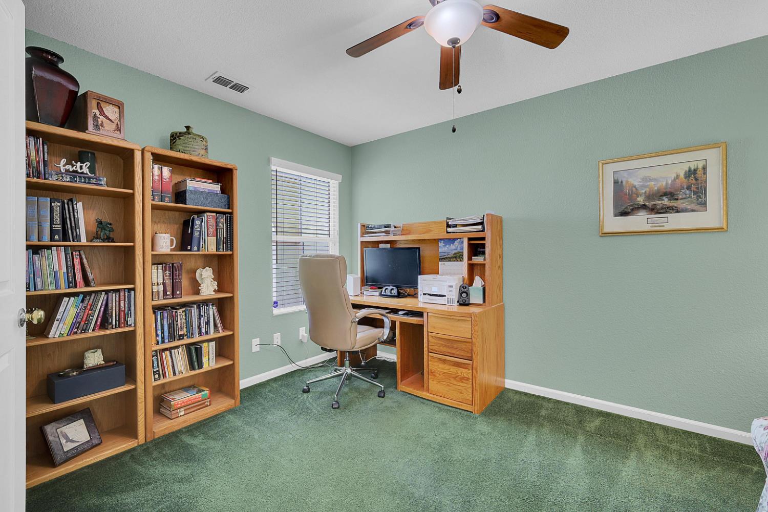9840 Ellis Way Live Oak, CA 95953 - Photo 13 of 44 a view of a workspace with furniture and cabinet