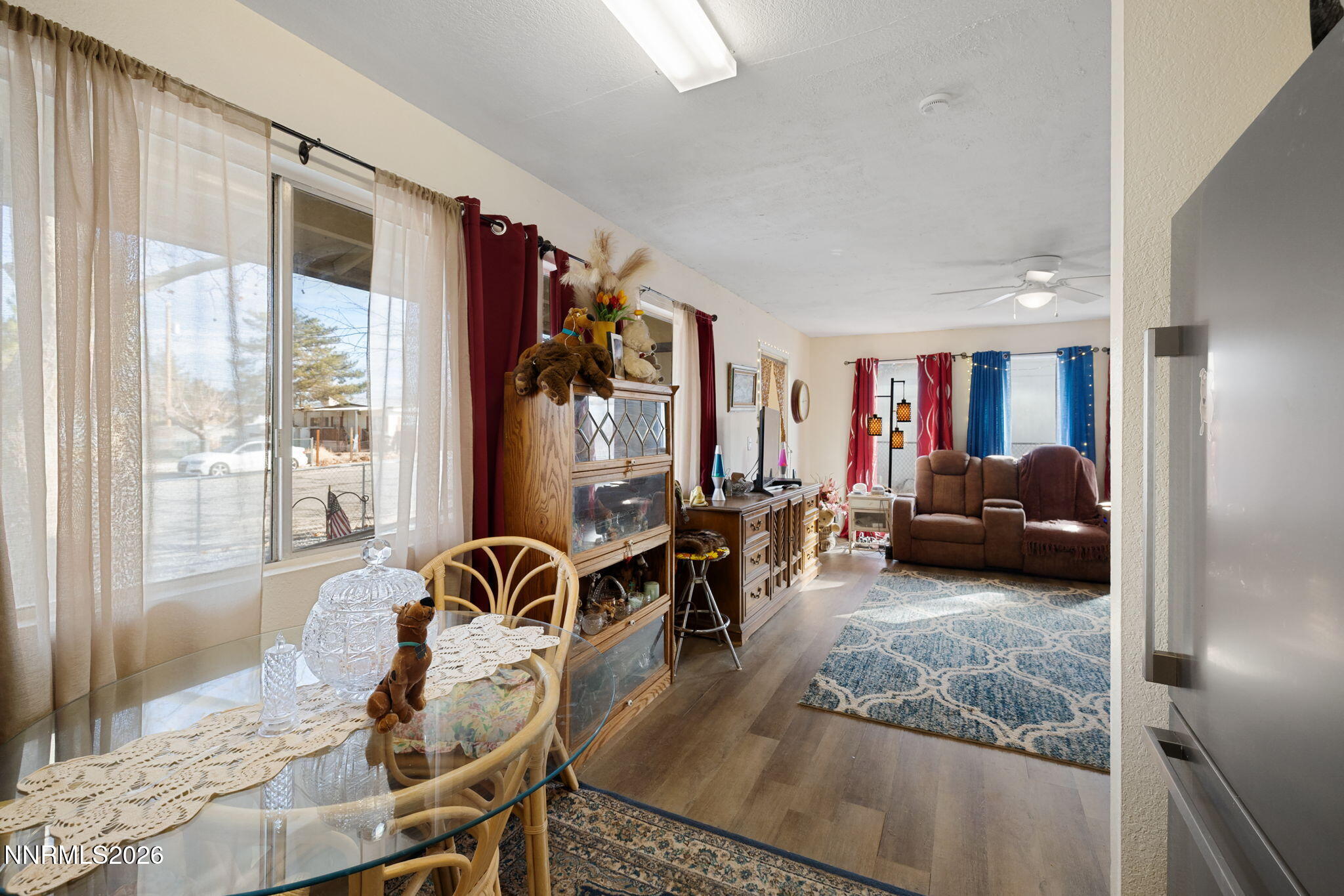 145 K Street Hawthorne, NV 89415 - Photo 12 of 25 a living room with furniture and a large window