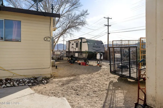 a front view of a house with parking