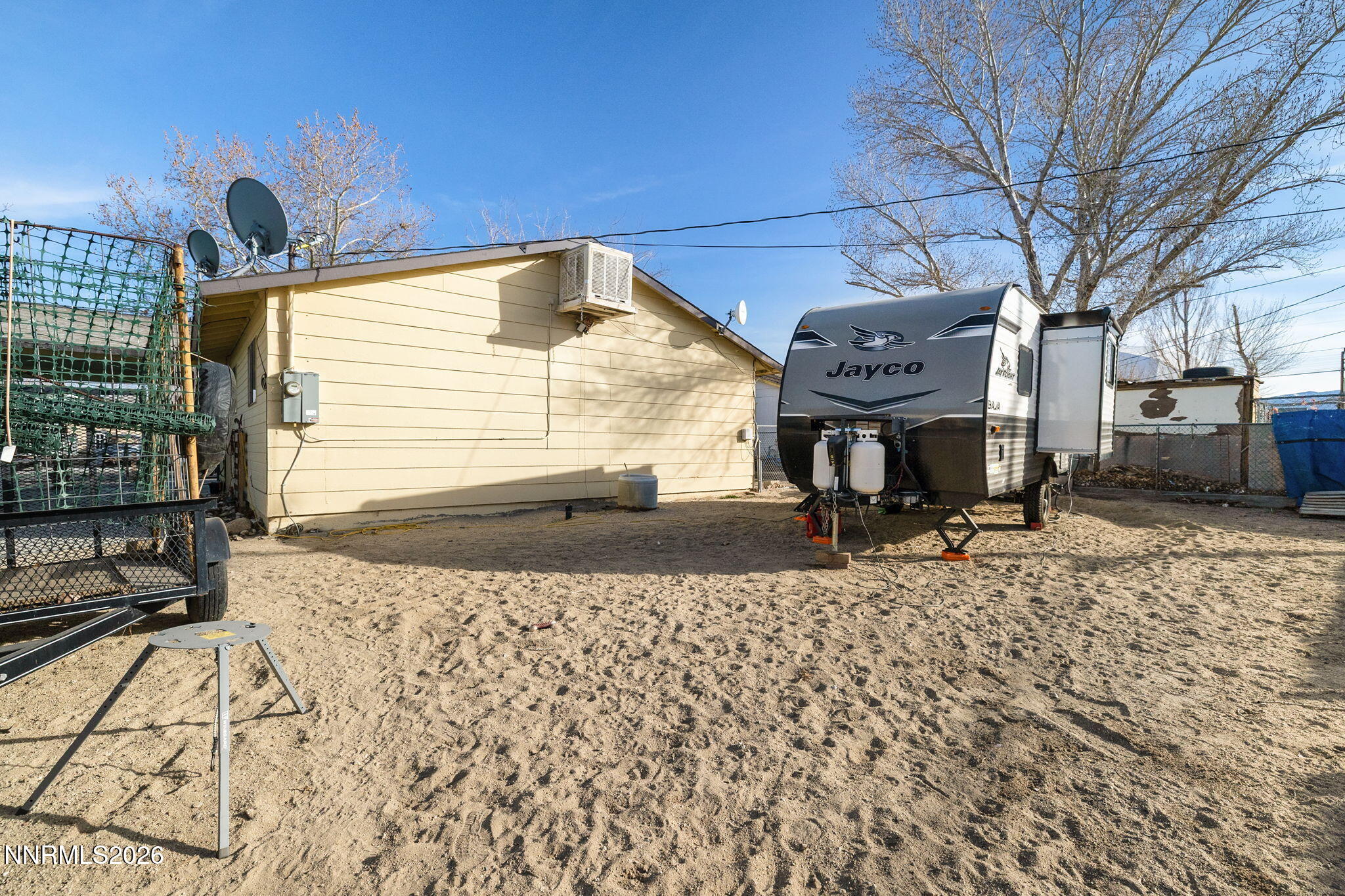 145 K Street Hawthorne, NV 89415 - Photo 23 of 25 a front view of a house with a yard