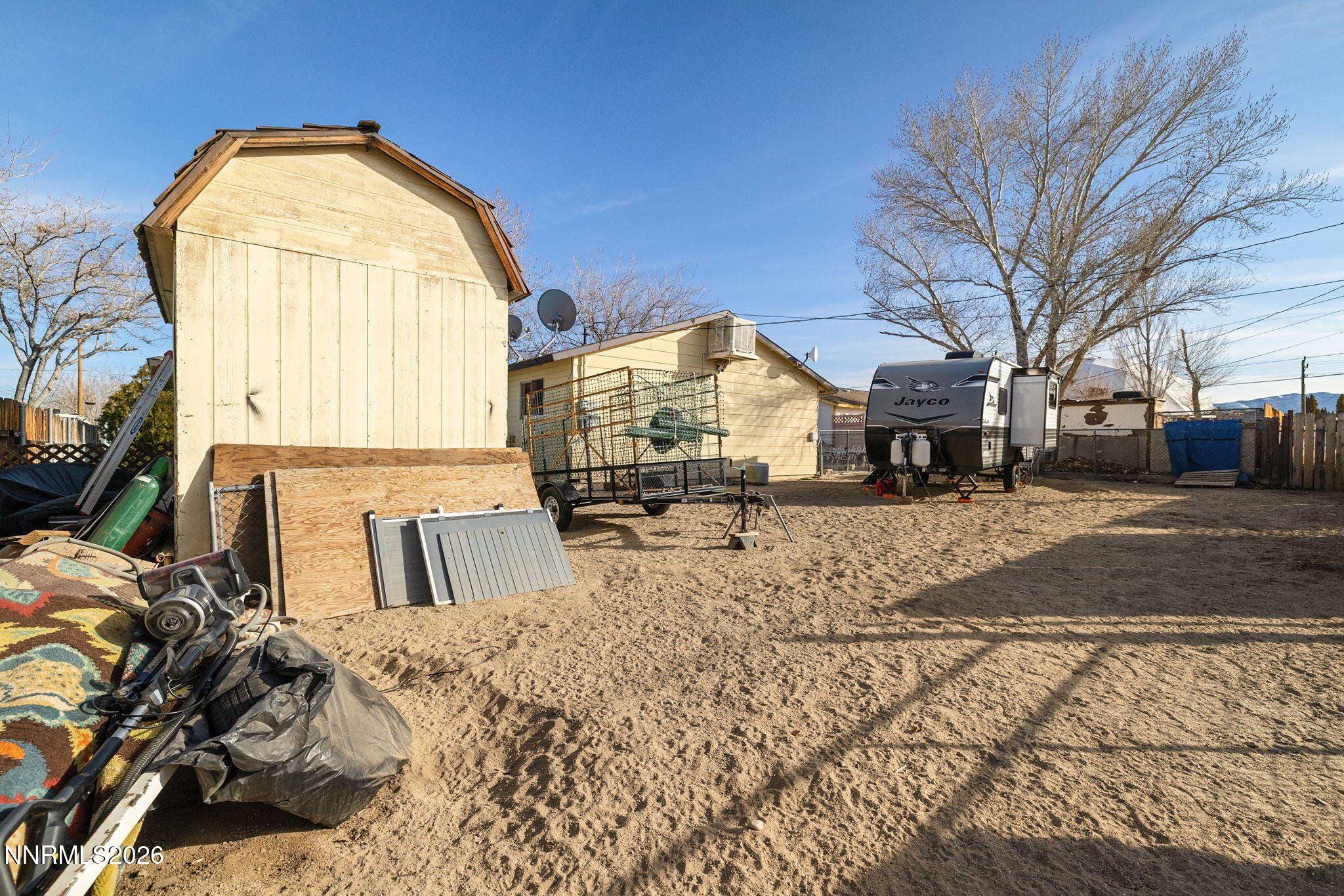 145 K Street Hawthorne, NV 89415 - Photo 24 of 25 a view of a house with a snow in the yard