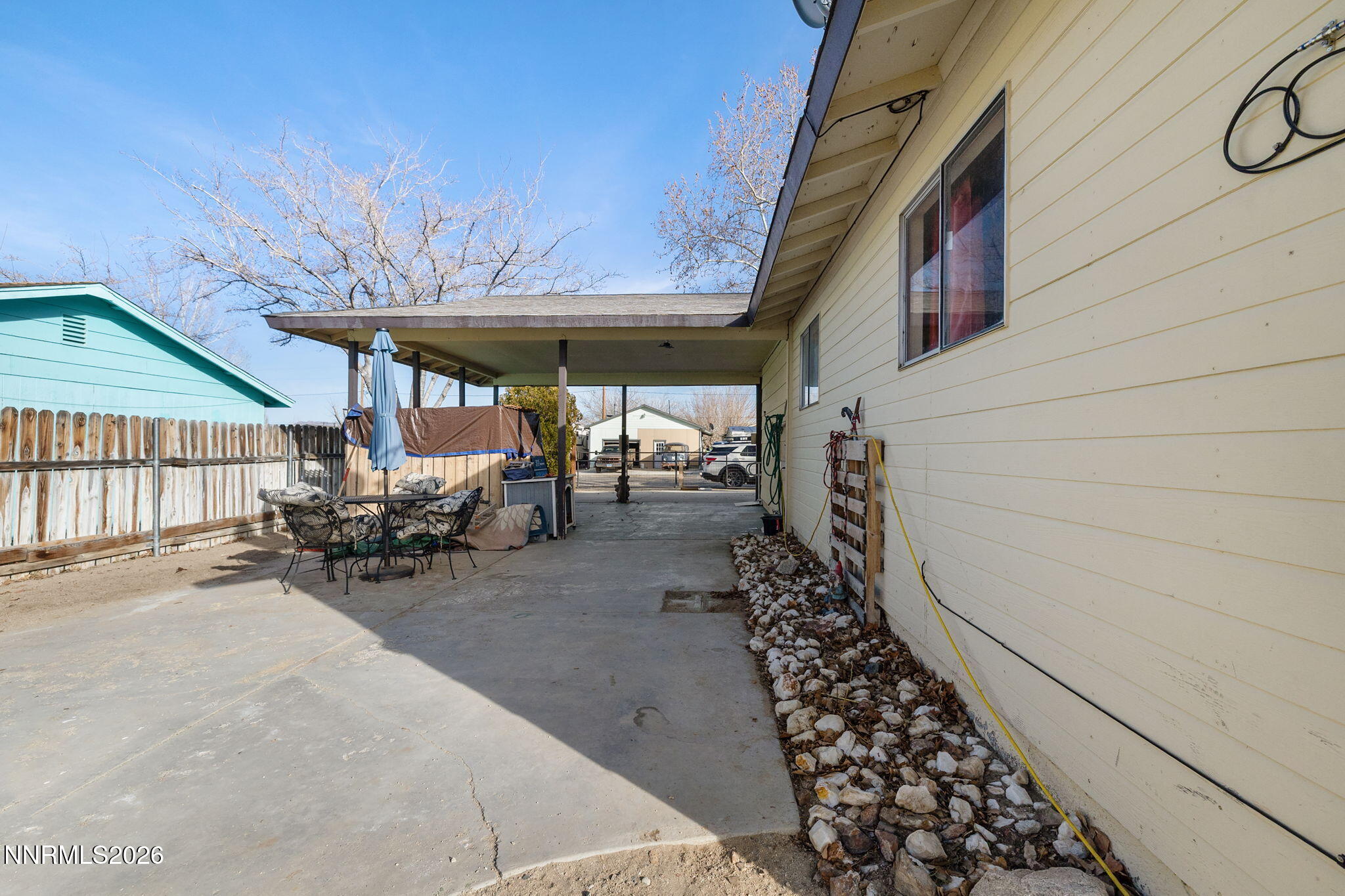 145 K Street Hawthorne, NV 89415 - Photo 25 of 25 a view of a patio with table and chairs