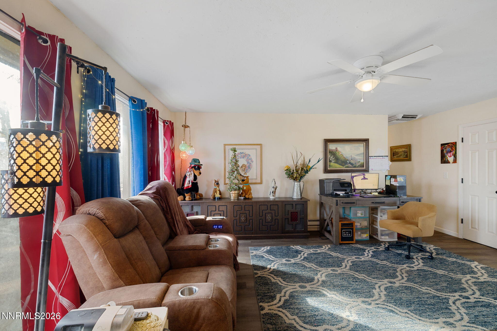 145 K Street Hawthorne, NV 89415 - Photo 6 of 25 a living room with furniture and a flat screen tv