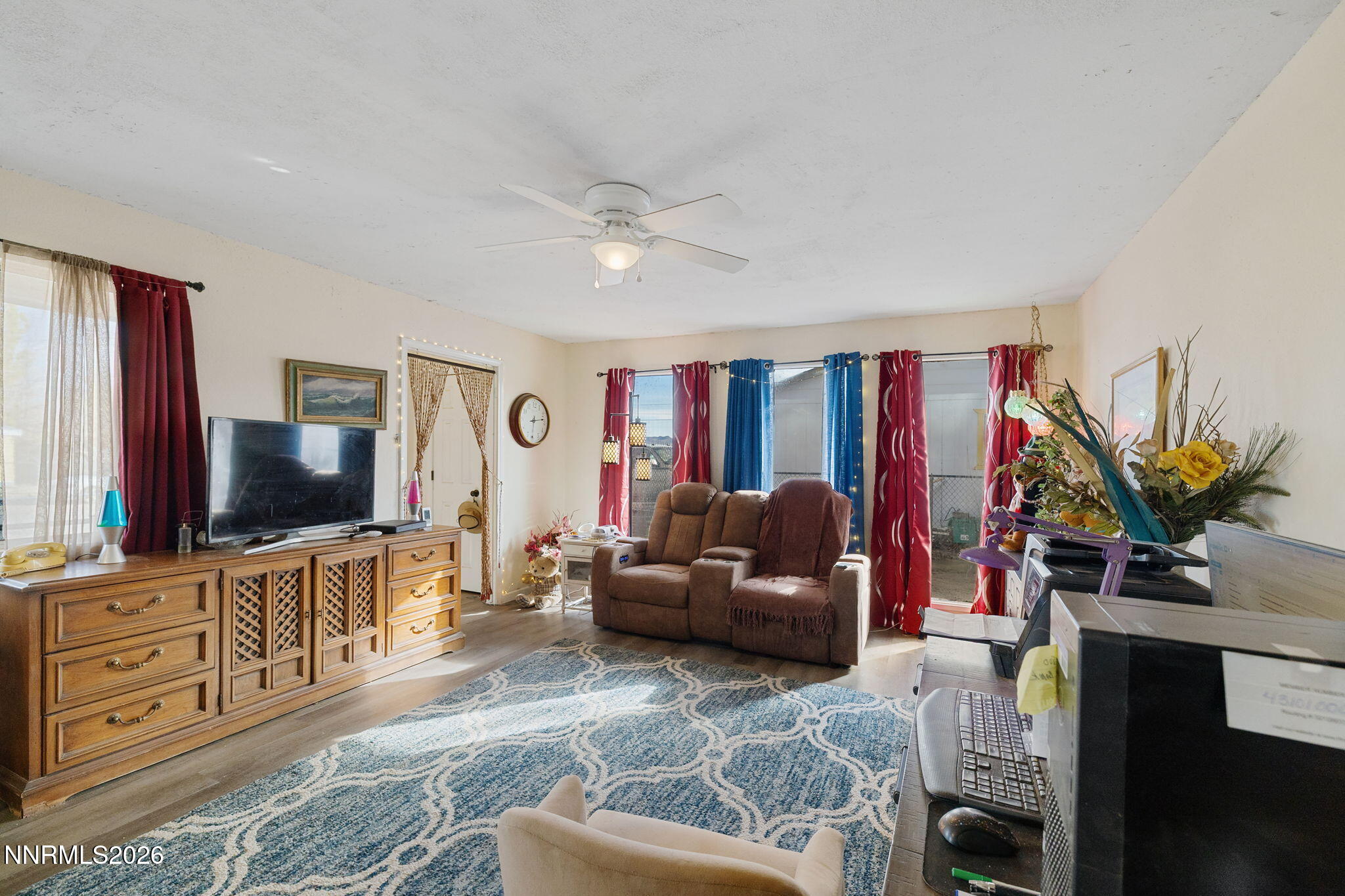 145 K Street Hawthorne, NV 89415 - Photo 8 of 25 a living room with furniture and a flat screen tv