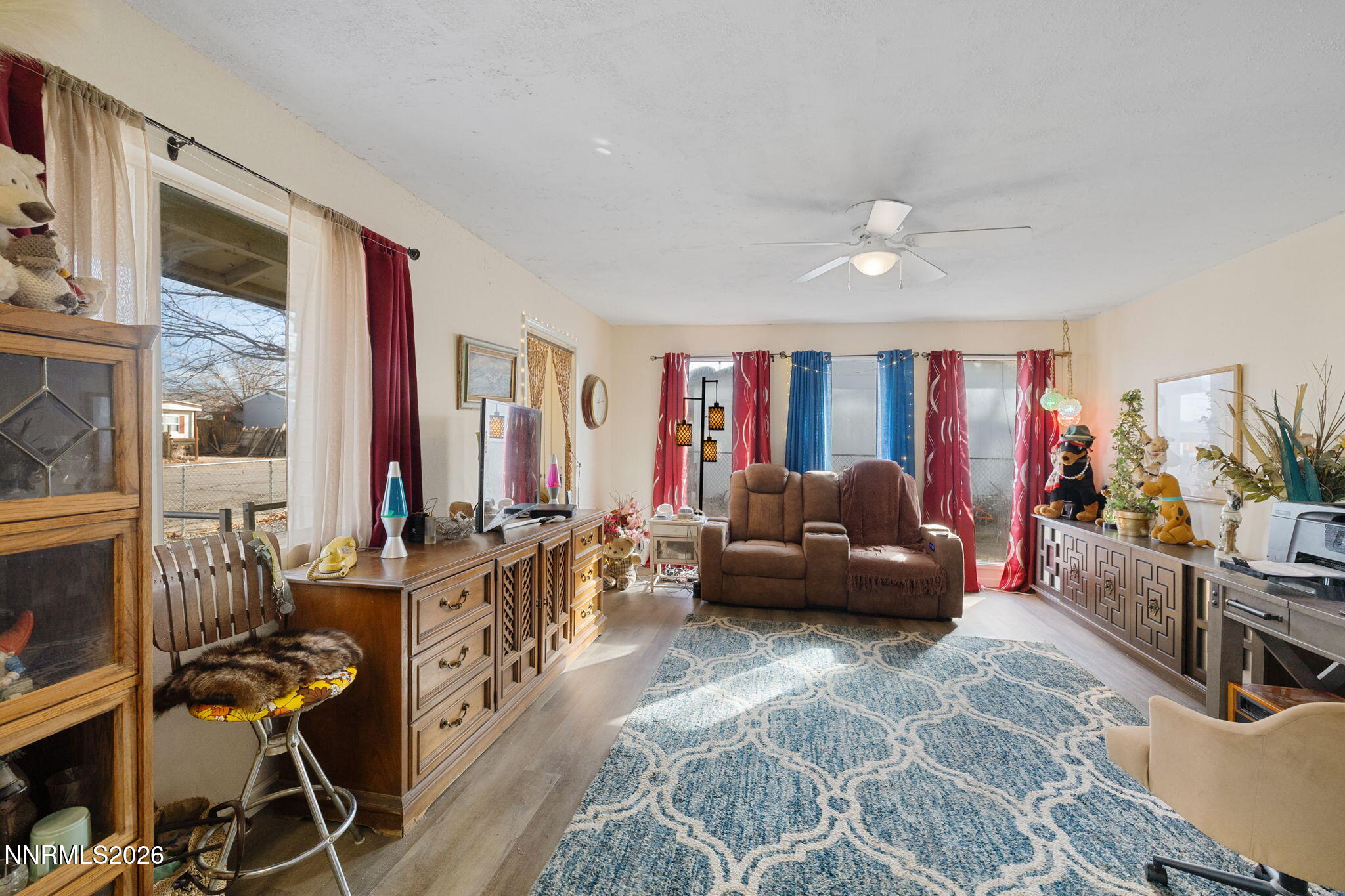 145 K Street Hawthorne, NV 89415 - Photo 9 of 25 a living room with furniture and a flat screen tv