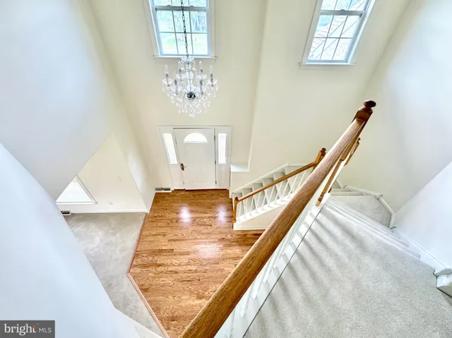a view of entryway and kitchen